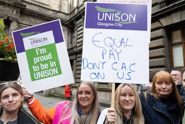 August 20, 2026, Glasgow, Scotland, UK: Members of the Unite, UNISON and GMB unions held a protest outside Glasgow City Chambers to coincide with a vote on a new pay and grading scheme for council employees. The unions claim the councils proposals would adversely affect low-paid workers, particularly women, who they say have been underpaid for two decades. Glasgow UK - ZUMAs357 20260820_zip_s357_004 Copyright: xCameronxScottx