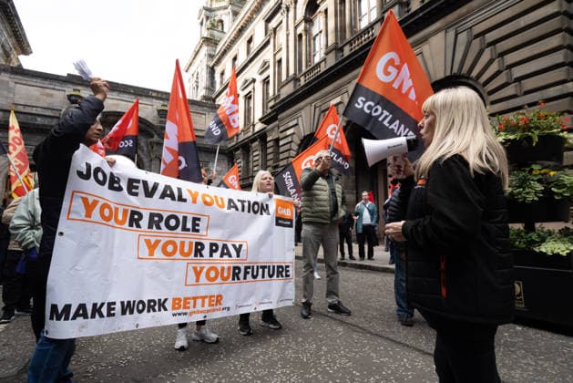 August 20, 2026, Glasgow, Scotland, UK: Members of the Unite, UNISON and GMB unions held a protest outside Glasgow City Chambers to coincide with a vote on a new pay and grading scheme for council employees. The unions claim the councils proposals would adversely affect low-paid workers, particularly women, who they say have been underpaid for two decades. Glasgow UK - ZUMAs357 20260820_zip_s357_007 Copyright: xCameronxScottx