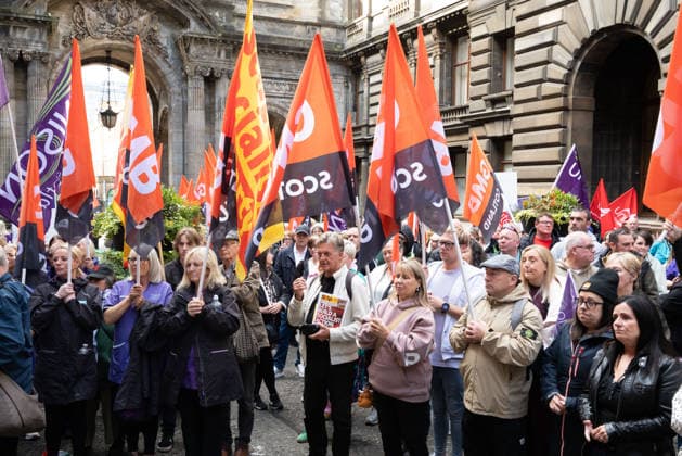 August 20, 2026, Glasgow, Scotland, UK: Members of the Unite, UNISON and GMB unions held a protest outside Glasgow City Chambers to coincide with a vote on a new pay and grading scheme for council employees. The unions claim the councils proposals would adversely affect low-paid workers, particularly women, who they say have been underpaid for two decades. Glasgow UK - ZUMAs357 20260820_zip_s357_009 Copyright: xCameronxScottx