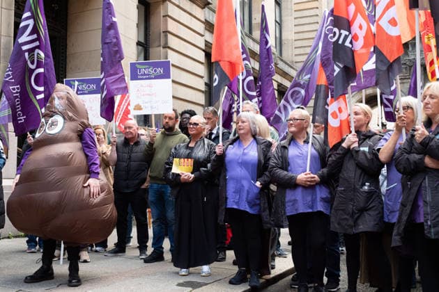 August 20, 2026, Glasgow, Scotland, UK: Members of the Unite, UNISON and GMB unions held a protest outside Glasgow City Chambers to coincide with a vote on a new pay and grading scheme for council employees. The unions claim the councils proposals would adversely affect low-paid workers, particularly women, who they say have been underpaid for two decades. Glasgow UK  - ZUMAs357 20260820_zip_s357_016 Copyright: xCameronxScottx