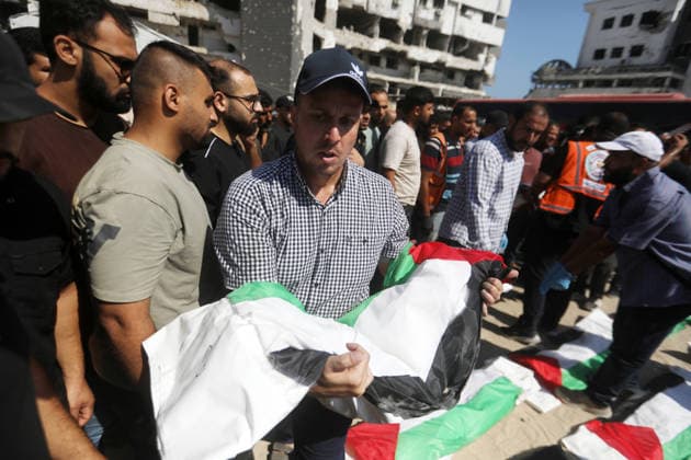 Palestinians Attend Funeral for 50 Bodies Recovered in Gaza City Palestinians attend a funeral for the remains of 50 people recovered from beneath the rubble of buildings destroyed in Israeli strikes during the war, in Gaza City, on August 20, 2026. Civil Defense crews continue search and recovery operations for bodies trapped under the rubble. Photo by Bilal Osama apaimages Gaza city Gaza Strip Palestinian Territory 200826_Gaza_BO_00(2) Copyright: xapaimagesxBilalxOsamax xapaimagesx