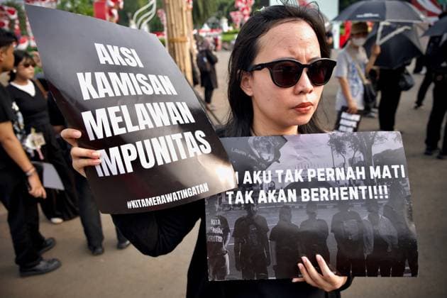August 20, 2026, Jakarta, Indonesia: JAKARTA, INDONESIA, AUGUST 20, 2026: Human rights activists take part in the 921st Kamisan protest across from the Merdeka Palace in Jakarta. The weekly Thursday demonstration was held to mark World Humanitarian Day under the theme, Ã¢â‚¬oeThe State Must Protect Its People, Not Silence the PeopleÃ¢â‚¬â ¢s Voices! Jakarta Indonesia  - ZUMAq101 20260820_zna_q101_083 Copyright: xEdsahxSetiawanx