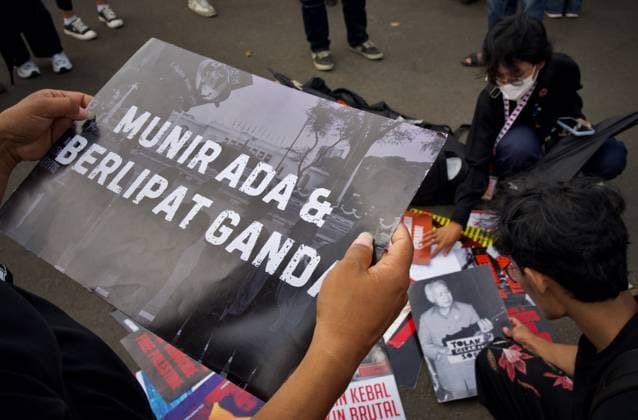 August 20, 2026, Jakarta, Indonesia: JAKARTA, INDONESIA, AUGUST 20, 2026: Human rights activists take part in the 921st Kamisan protest across from the Merdeka Palace in Jakarta. The weekly Thursday demonstration was held to mark World Humanitarian Day under the theme, Ã¢â‚¬oeThe State Must Protect Its People, Not Silence the PeopleÃ¢â‚¬â ¢s Voices! Jakarta Indonesia  - ZUMAq101 20260820_zna_q101_097 Copyright: xEdsahxSetiawanx