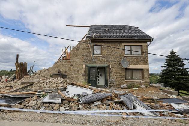 A house is destroyed, after yesterday s passage of a mini-tornado in Bullingen, pictured taken on Thursday 20 August 2026. The Belgian Eifel region got hit by whirlwind and severe thunderstorms on Wednesday evening.  JULIENxWARNAND 183826026
