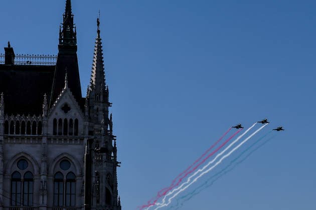 (260820) -- BUDAPEST, Aug. 20, 2026 -- A formation of Hungarian Air Force fighter jets is pictured in a military air parade over the Danube in Budapest, Hungary, on Aug. 20, 2026. Hungary marks its national day on Thursday with traditional ceremonies, music concerts, and a redesigned evening spectacle in Budapest. (Photo by Xinhua) HUNGARY-BUDAPEST-NATIONAL DAY-CELEBRATION DavidxBalogh 