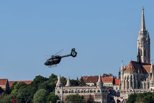 (260820) -- BUDAPEST, Aug. 20, 2026 -- A Hungarian Air Force helicopter participates in a military air parade over the Danube in Budapest, Hungary, on Aug. 20, 2026. Hungary marks its national day on Thursday with traditional ceremonies, music concerts, and a redesigned evening spectacle in Budapest. (Photo by Xinhua) HUNGARY-BUDAPEST-NATIONAL DAY-CELEBRATION DavidxBalogh 