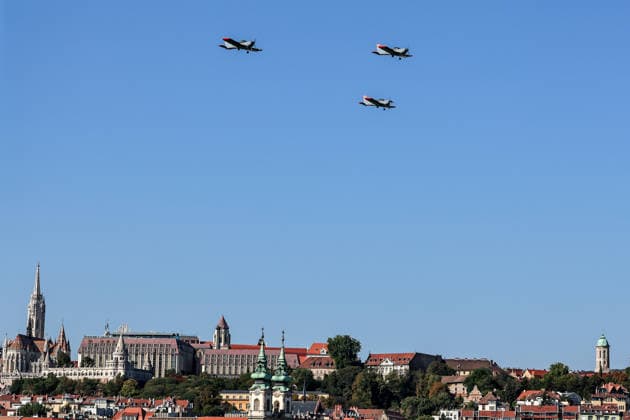 (260820) -- BUDAPEST, Aug. 20, 2026 -- A formation of Hungarian Air Force fighter jets is pictured in a military air parade over the Danube in Budapest, Hungary, on Aug. 20, 2026. Hungary marks its national day on Thursday with traditional ceremonies, music concerts, and a redesigned evening spectacle in Budapest. (Photo by Xinhua) HUNGARY-BUDAPEST-NATIONAL DAY-CELEBRATION DavidxBalogh 