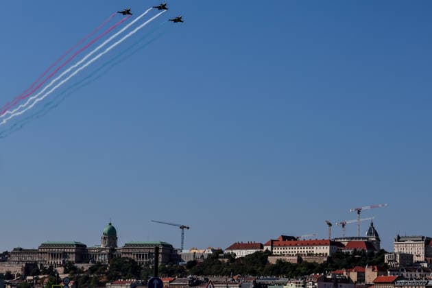 (260820) -- BUDAPEST, Aug. 20, 2026 -- A formation of Hungarian Air Force fighter jets is pictured in a military air parade over the Danube in Budapest, Hungary, on Aug. 20, 2026. Hungary marks its national day on Thursday with traditional ceremonies, music concerts, and a redesigned evening spectacle in Budapest. (Photo by Xinhua) HUNGARY-BUDAPEST-NATIONAL DAY-CELEBRATION DavidxBalogh 