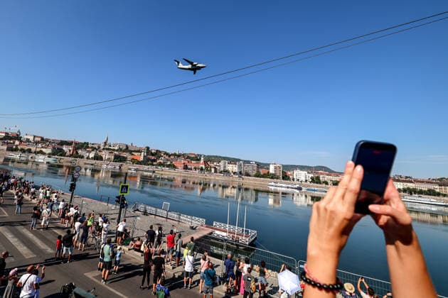 (260820) -- BUDAPEST, Aug. 20, 2026 -- A Hungarian Air Force military aircraft participates in a military air parade over the Danube in Budapest, Hungary, on Aug. 20, 2026. Hungary marks its national day on Thursday with traditional ceremonies, music concerts, and a redesigned evening spectacle in Budapest. (Photo by Xinhua) HUNGARY-BUDAPEST-NATIONAL DAY-CELEBRATION DavidxBalogh 