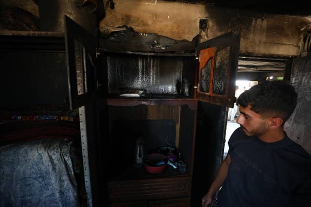 Palestinians Inspect Fire-Damaged Home South of Hebron Palestinians inspect a house damaged by fire that residents said was set by Israeli settlers in the Khallat al-Farra area of Yatta, south of Hebron, in the West Bank, on August 20, 2026. Photo by Mamoun Wazwaz apaimages Hebron West Bank Palestinian Territory 200826_Hebron_MW_01(11) Copyright: xapaimagesxMamounxWazwazx xapaimagesx
