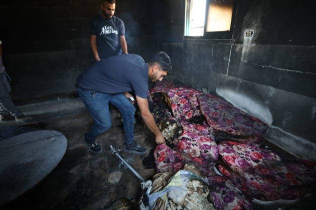 Palestinians Inspect Fire-Damaged Home South of Hebron Palestinians inspect a house damaged by fire that residents said was set by Israeli settlers in the Khallat al-Farra area of Yatta, south of Hebron, in the West Bank, on August 20, 2026. Photo by Mamoun Wazwaz apaimages Hebron West Bank Palestinian Territory 200826_Hebron_MW_01(8) Copyright: xapaimagesxMamounxWazwazx xapaimagesx