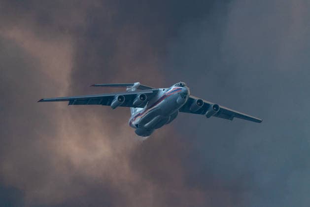 August 20, 2026, Grebenac, Vojvodina, Serbia: 2026820, Grebenac, Serbia - An Ilyushin Il-76 aircraft belonging to the Russian Ministry of Emergency Situations (EMERCOM) drops water over a massive wildfire in the Deliblato Sands (Deliblatska Pescara) Special Nature Reserve. The Russian water bomber was deployed to assist Serbian emergency services in battling the blaze in the strictly protected natural area, often referred to as the European Sahara. Grebenac Serbia  - ZUMAd223 20260820_zip_d223_008 Copyright: xMarkoxDimicx
