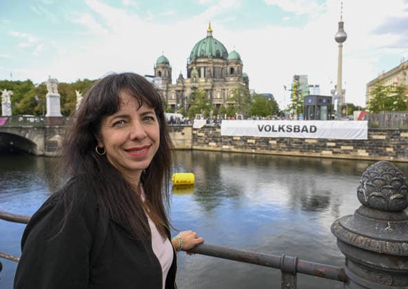 Protesters gather in Berlin calling for end to century-old swimming ban in Spree River BERLIN, GERMANY - AUGUST 20: Elif Eralp, Left Party candidate for Berlin state governor in the upcoming September 20 state elections, takes part in the protest held at Schinkelplatz near the Spree River in Berlin, Germany, on August 20, 2026, to demand the lifting of a 101-year-old swimming ban in the historic waterway. Responding to a call by the Flussbad Berlin association, participants displayed banners and placards advocating for clean water initiatives and public access to open-water swimming along designated central stretches of the river. Halil Sagirkaya Anadolu Berlin Germany. Editorial use only. Please get in touch for any other usage.  Copyright: x2026xAnadoluxHalilxSagirkayax
