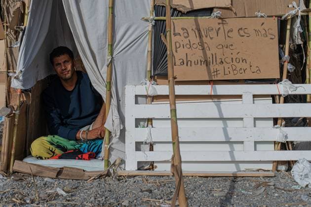 Migrants live in makeshift settlement on Ceuta beach CEUTA, SPAIN, AUGUST 20, 2026: Hundreds of migrants live in a makeshift settlement at Trampolin Beach in Ceuta, using shelters built from reeds, plastic and other discarded materials. Ceuta Spain Copyright: x xClaudioxPalmax xJNAxPressx