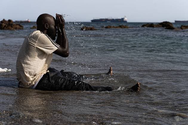 Migrants live in makeshift settlement on Ceuta beach CEUTA, SPAIN, AUGUST 20, 2026: Hundreds of migrants live in a makeshift settlement at Trampolin Beach in Ceuta, using shelters built from reeds, plastic and other discarded materials. Ceuta Spain Copyright: x xClaudioxPalmax xJNAxPressx