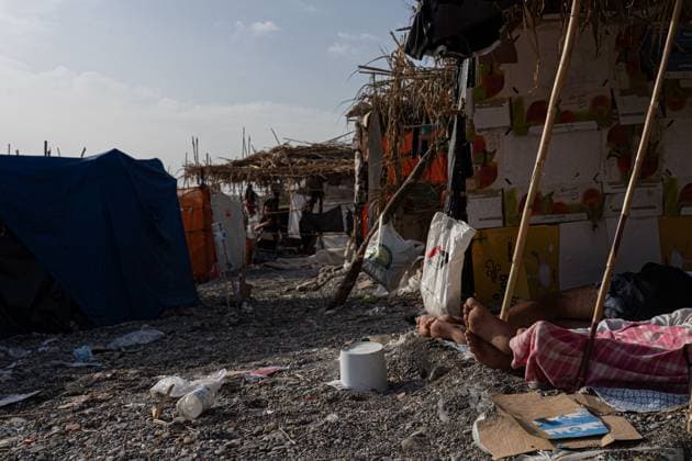 Migrants live in makeshift settlement on Ceuta beach CEUTA, SPAIN, AUGUST 20, 2026: Hundreds of migrants live in a makeshift settlement at Trampolin Beach in Ceuta, using shelters built from reeds, plastic and other discarded materials. Ceuta Spain Copyright: x xClaudioxPalmax xJNAxPressx
