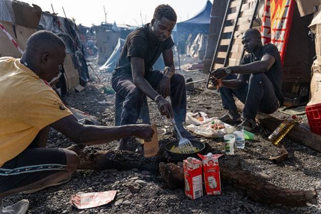 Migrants live in makeshift settlement on Ceuta beach CEUTA, SPAIN, AUGUST 20, 2026: Hundreds of migrants live in a makeshift settlement at Trampolin Beach in Ceuta, using shelters built from reeds, plastic and other discarded materials. Ceuta Spain Copyright: x xClaudioxPalmax xJNAxPressx