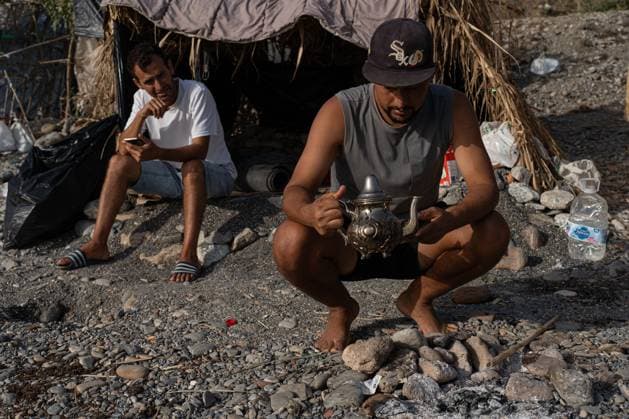 Migrants live in makeshift settlement on Ceuta beach CEUTA, SPAIN, AUGUST 20, 2026: Hundreds of migrants live in a makeshift settlement at Trampolin Beach in Ceuta, using shelters built from reeds, plastic and other discarded materials. Ceuta Spain Copyright: x xClaudioxPalmax xJNAxPressx