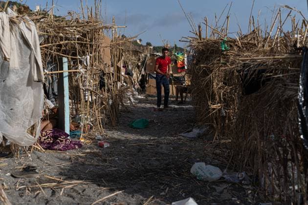 Migrants live in makeshift settlement on Ceuta beach CEUTA, SPAIN, AUGUST 20, 2026: Hundreds of migrants live in a makeshift settlement at Trampolin Beach in Ceuta, using shelters built from reeds, plastic and other discarded materials. Ceuta Spain Copyright: x xClaudioxPalmax xJNAxPressx