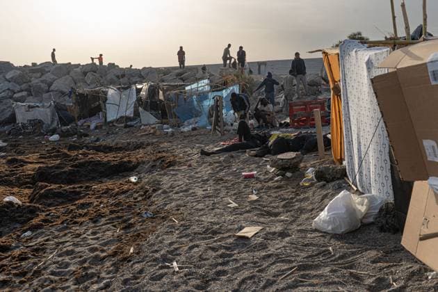 Migrants live in makeshift settlement on Ceuta beach CEUTA, SPAIN, AUGUST 20, 2026: Hundreds of migrants live in a makeshift settlement at Trampolin Beach in Ceuta, using shelters built from reeds, plastic and other discarded materials. Ceuta Spain Copyright: x xClaudioxPalmax xJNAxPressx