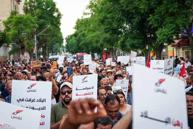 August 20, 2026, Tunis, Tunis, Tunisia, Tunisia: Tunisian protesters gather in downtown Tunis, Tunisia during a demonstration organized by the Nafas opposition movement on August 20th, 2026, amid growing public anger over electricity and water shortages, rising living costs, shortages of essential medicines and unemployment. The protest comes during a summer of extreme heat and follows growing calls for political change and accountability from President Kais SaiedÃ¢â‚¬â ¢s government Tunis Tunisia - ZUMAm342 20260820_zsp_m342_004 Copyright: xHasanxMradx