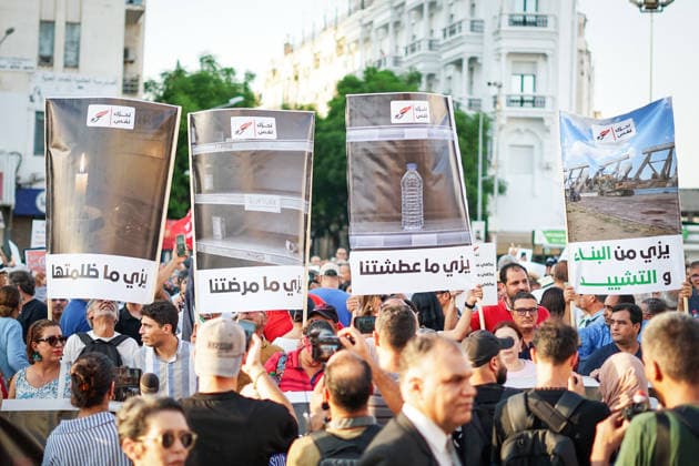 August 20, 2026, Tunis, Tunis, Tunisia, Tunisia: Tunisian protesters gather in downtown Tunis, Tunisia during a demonstration organized by the Nafas opposition movement on August 20th, 2026, amid growing public anger over electricity and water shortages, rising living costs, shortages of essential medicines and unemployment. The protest comes during a summer of extreme heat and follows growing calls for political change and accountability from President Kais SaiedÃ¢â‚¬â ¢s government Tunis Tunisia - ZUMAm342 20260820_zsp_m342_001 Copyright: xHasanxMradx