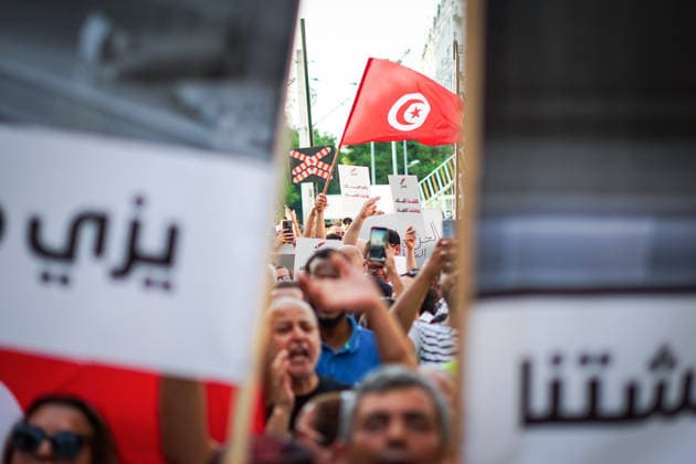 August 20, 2026, Tunis, Tunis, Tunisia, Tunisia: Tunisian protesters gather in downtown Tunis, Tunisia during a demonstration organized by the Nafas opposition movement on August 20th, 2026, amid growing public anger over electricity and water shortages, rising living costs, shortages of essential medicines and unemployment. The protest comes during a summer of extreme heat and follows growing calls for political change and accountability from President Kais SaiedÃ¢â‚¬â ¢s government Tunis Tunisia - ZUMAm342 20260820_zsp_m342_002 Copyright: xHasanxMradx