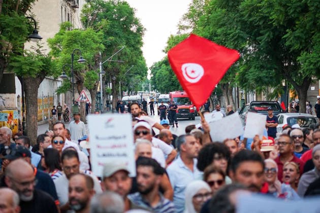 August 20, 2026, Tunis, Tunis, Tunisia, Tunisia: Tunisian protesters gather in downtown Tunis, Tunisia during a demonstration organized by the Nafas opposition movement on August 20th, 2026, amid growing public anger over electricity and water shortages, rising living costs, shortages of essential medicines and unemployment. The protest comes during a summer of extreme heat and follows growing calls for political change and accountability from President Kais SaiedÃ¢â‚¬â ¢s government Tunis Tunisia - ZUMAm342 20260820_zsp_m342_009 Copyright: xHasanxMradx
