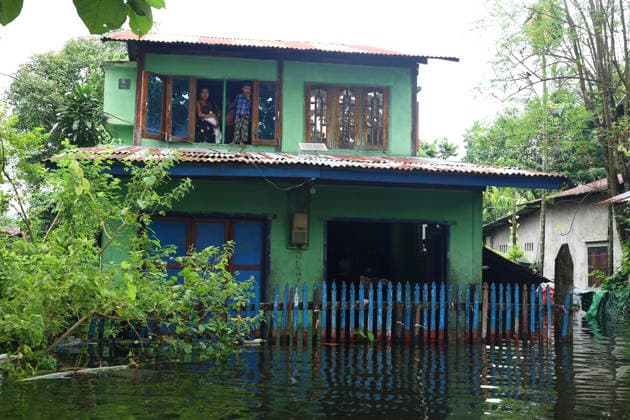 August 20, 2026, Ngathaingchaung, Ayeyarwady Region, Myanmar: A resident remains inside a flooded house in Ngathaingchaung Township, Ayeyarwady Region, Myanmar..In Laymyethna Township, Ayeyarwady Region, the Ngawun River embankment collapsed on July 31, leaving nearby towns including Hinthada, Yegyi, Ngathaingchaung, Kyonpyaw and Kyaunggon still inundated for three weeks, affecting tens of thousands of people, officials said. Ngathaingchaung Myanmar  - ZUMAn324 20260820_zip_n324_002 Copyright: xAyexMyaxNaingx