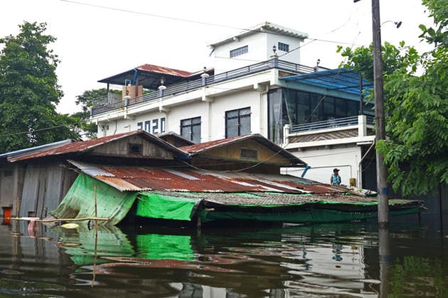 August 20, 2026, Ngathaingchaung, Ayeyarwady Region, Myanmar: A resident remains inside a flooded house in Ngathaingchaung Township, Ayeyarwady Region, Myanmar..In Laymyethna Township, Ayeyarwady Region, the Ngawun River embankment collapsed on July 31, leaving nearby towns including Hinthada, Yegyi, Ngathaingchaung, Kyonpyaw and Kyaunggon still inundated for three weeks, affecting tens of thousands of people, officials said. Ngathaingchaung Myanmar - ZUMAn324 20260820_zip_n324_010 Copyright: xAyexMyaxNaingx