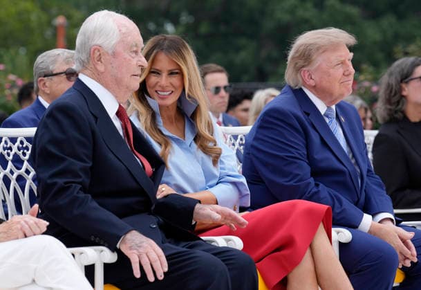 (L to R) Penske Corporation founder Roger Penske, first lady Melania Trump and US President Donald Trump attend an announcement regarding the administration s new Fostering the Future program in the Rose Garden at the White House in Washington, DC on Thursday, August 20, 2026.  WASP20260820107 YurixGripas