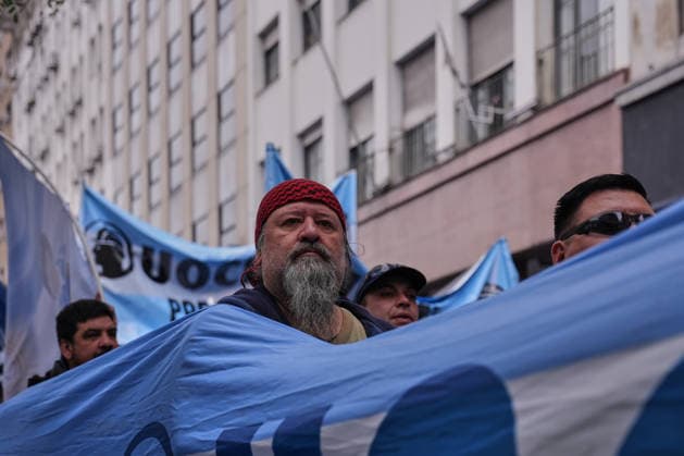 Protest against growing household debt in Buenos Aires BUENOS AIRES, ARGENTINA – AUGUST 20: Members and leaders of the General Confederation of Labor (CGT) march toward the Ministry of Economy during a protest against growing household debt and rising living costs, in Buenos Aires, Argentina on August 20, 2026. Demonstrators gathered in the national capital to demand urgent economic relief, highlighting the severe financial strain faced by millions of working-class families struggling to cover basic household expenses. The mobilization called by the country s main labor confederation focused on the critical impact of debt on everyday workers amid ongoing economic challenges. Luciano Gonzalez Anadolu Buenos Aires Argentina. Editorial use o  Copyright: x2026xAnadoluxLucianoxGonzalezx