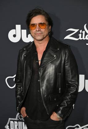 Guitar Center s Drum-Off National Finale Los Angeles CA Aug 20: John Stamos at Guitar Center s Drum-Off National Finale on August 20, 2026 Credit: Michael Mattes Admedia EDITORIAL USE ONLY  Copyright: xx AdMediax admphotosthree012235