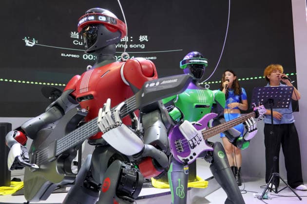 2026 World Robot Congress in Beijing BEIJING, CHINA - AUGUST 20, 2026 - The robot band and staff performed together on stage at the 2026 World Robot Conference in Beijing, China on August 20, 2026. Beijing Beijing China  Copyright: xCFOTOx i1787313212611