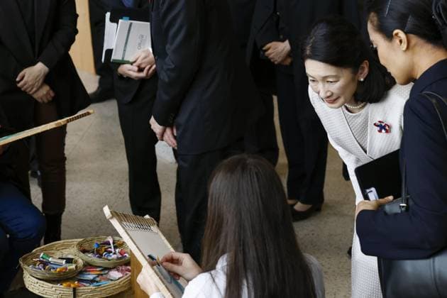 Japan crown prince, crown princess in Paraguay Japan s Crown Prince Fumihito and Crown Princess Kiko watch a demonstration of traditional lace knitting called Nanduti in Asuncion, Paraguay, on Aug. 20, 2026, during their official trip to the South American country.  A14AA0005626361P