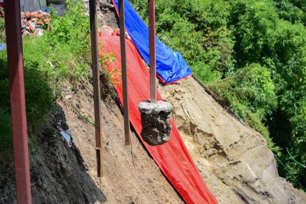 August 21, 2026, Kathmandu, Bagmati, Nepal: A two-and-a-half-storey house is seen collapsed after the ground beneath it sank due to rainfall in Bansbari, Kathmandu, Nepal, on August 21, 2026. No human casualties were reported in the incident. Kathmandu Nepal - ZUMAs330 20260821_zsp_s330_002 Copyright: xSafalxPrakashxShresthax