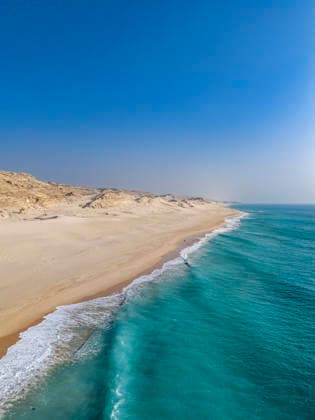 Vast sand dunes meet the Indian Ocean along a remote coastline in Puntland, Somalia Copyright: MichaelxRunkel 1184-17143