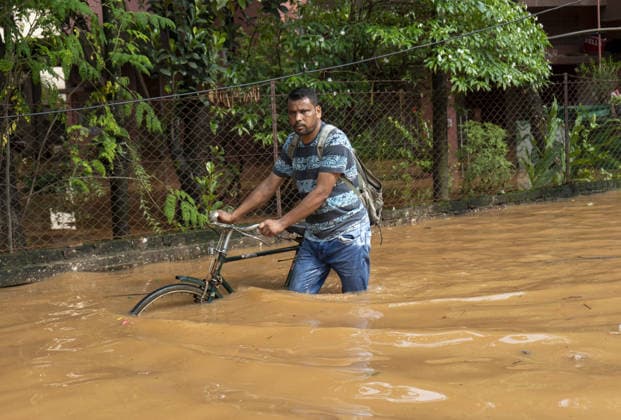 Heavy monsoon rains cause floodings in Assam GUWAHATI, ASSAM, INDIA - AUGUST 21: Residents walks through dirty water of a flooded street after heavy monsoon rains in Guwahati, India on August 21, 2026. David Talukdar Anadolu Guwahati India. Editorial use only. Please get in touch for any other usage.  Copyright: x2026xAnadoluxDavidxTalukdarx