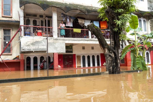 Heavy monsoon rains cause floodings in Assam GUWAHATI, ASSAM, INDIA - AUGUST 21: Residents commute in a cycle rickshaw through a flooded street after heavy monsoon rains in Guwahati, India on August 21, 2026. David Talukdar Anadolu Guwahati India. Editorial use only. Please get in touch for any other usage.  Copyright: x2026xAnadoluxDavidxTalukdarx