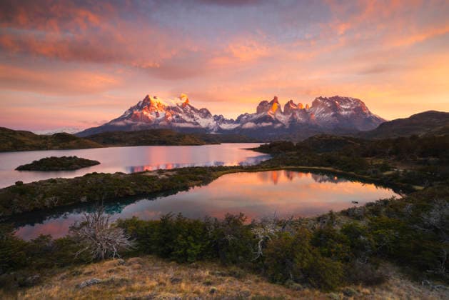 Sunrise over Lake Pehoe with Cuernos del Paine in the distance at Torres del Paine National Park in Chile Copyright: carloxalbertoxconti 1369-386