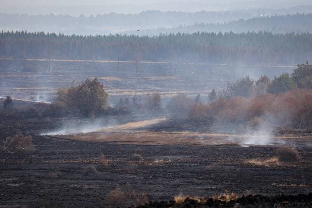 Picture taken on the site of the fires in the Hautes Fagnes (High Fens) nature reserve, on Friday 21 August 2026. The fire started on August 14th and 3000 hectares (on a total of 4500) are impacted.  JULIENxWARNAND 183892324