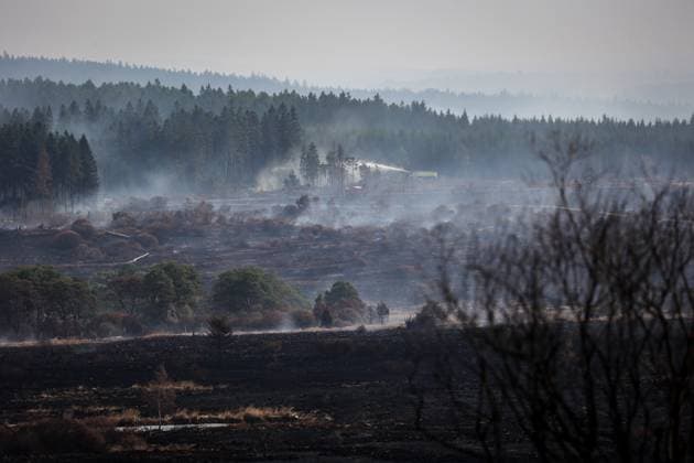 Picture taken on the site of the fires in the Hautes Fagnes (High Fens) nature reserve, on Friday 21 August 2026. The fire started on August 14th and 3000 hectares (on a total of 4500) are impacted.  JULIENxWARNAND 183892608