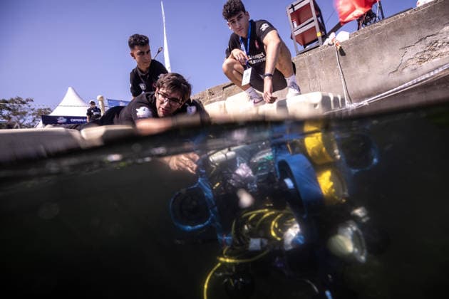 TEKNOFEST Blue Homeland KOCAELI, TURKIYE - AUGUST 21: Participants work on an unmanned underwater vehicle during the Unmanned Underwater Systems Competition held as part of TEKNOFEST Blue Homeland at the Golcuk Naval Shipyard Command in Kocaeli, Turkiye, on August 21, 2026. Organized under the main leadership of the Turkish National Defense Ministry and the Turkish Technology Team Foundation (T3 Foundation), with Anadolu as the Global Communication Partner, the event showcases Turkiye s maritime power, defense capabilities, and indigenous technologies. Gathering technology and defense industry enthusiasts around a maritime focus, the festival will welcome visitors through August 23. Sebnem Coskun Anadolu Kocaeli Turkey. Editorial use only  Copyright: x2026xAnadoluxSebnemxCoskunx