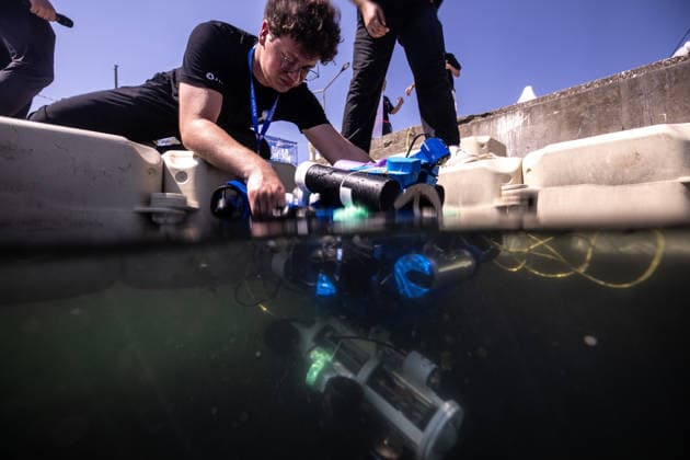 TEKNOFEST Blue Homeland KOCAELI, TURKIYE - AUGUST 21: Participants work on an unmanned underwater vehicle during the Unmanned Underwater Systems Competition held as part of TEKNOFEST Blue Homeland at the Golcuk Naval Shipyard Command in Kocaeli, Turkiye, on August 21, 2026. Organized under the main leadership of the Turkish National Defense Ministry and the Turkish Technology Team Foundation (T3 Foundation), with Anadolu as the Global Communication Partner, the event showcases Turkiye s maritime power, defense capabilities, and indigenous technologies. Gathering technology and defense industry enthusiasts around a maritime focus, the festival will welcome visitors through August 23. Sebnem Coskun Anadolu Kocaeli Turkey. Editorial use only  Copyright: x2026xAnadoluxSebnemxCoskunx