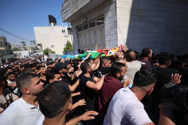 August 21, 2026, Hebron, Palestine, State of: SAÃ¢â‚¬â ¢IR, HEBRON, WEST BANK, AUGUST 21, 2026: Palestinians attend the funeral of 17-year-old Karim Sand Shalaldeh in the village of SaÃ¢â‚¬â ¢ir, east of Hebron, after he was killed during a settler attack on the village earlier in the day. Several Palestinians were also injured and a house was set on fire during the attack. Hebron Palestine, State of - ZUMAq101 20260821_zna_q101_091 Copyright: xMosabxShawerx