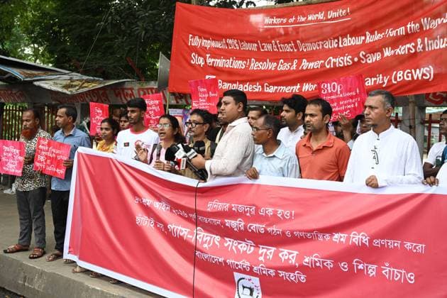 August 21, 2026, Dhaka, Bangladesh: DHAKA, BANGLADESH, AUGUST 21, 2026: Activists from Bangladesh Garment Workers Solidarity take part in a protest rally in Dhaka, demanding full implementation of the 2026 labour law, democratic labour rules, action by the wage board, an end to worker terminations, and measures to address gas and power shortages affecting workers and the garment industry. Dhaka Bangladesh - ZUMAq101 20260821_zna_q101_111 Copyright: xMamunurxRashidx