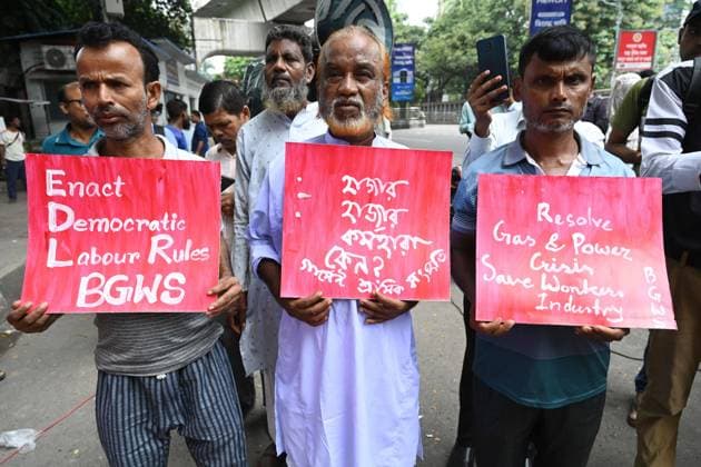 August 21, 2026, Dhaka, Bangladesh: DHAKA, BANGLADESH, AUGUST 21, 2026: Activists from Bangladesh Garment Workers Solidarity take part in a protest rally in Dhaka, demanding full implementation of the 2026 labour law, democratic labour rules, action by the wage board, an end to worker terminations, and measures to address gas and power shortages affecting workers and the garment industry. Dhaka Bangladesh - ZUMAq101 20260821_zna_q101_117 Copyright: xMamunurxRashidx