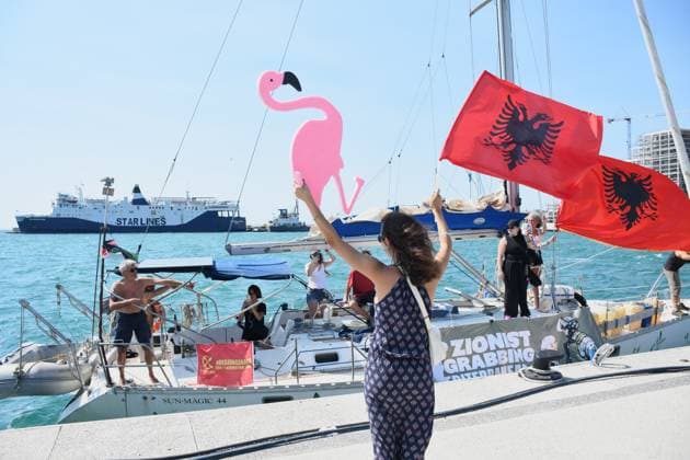 Global Sumud Flotilla activists arrive in Albania VLORE, ALBANIA - AUGUST 21: Boats carrying pro-Palestinian Italian and Albanian activists arrive off the coast of Vlore after sailing from Brindisi, Italy, on August 21, 2026 in Vlore, Albania. Several of the vessels had reportedly been damaged by the Israeli military during the flotilla s previous mission. The activists arrival coincides with the anniversary of the 1991 exodus in which thousands of Albanian refugees reached Italy s Puglia region aboard an overcrowded ship. The group is also expected to support the Flamingo Revolution protest against the reported sale of a beach in Zvernec for a tourism project allegedly linked to Ivanka Trump and Jared Kushner. Olsi Shehu Anadolu Vlore  Copyright: x2026xAnadoluxOlsixShehux