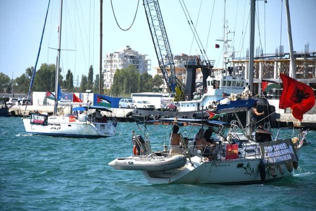 Global Sumud Flotilla activists arrive in Albania VLORE, ALBANIA - AUGUST 21: Boats carrying pro-Palestinian Italian and Albanian activists arrive off the coast of Vlore after sailing from Brindisi, Italy, on August 21, 2026 in Vlore, Albania. Several of the vessels had reportedly been damaged by the Israeli military during the flotilla s previous mission. The activists arrival coincides with the anniversary of the 1991 exodus in which thousands of Albanian refugees reached Italy s Puglia region aboard an overcrowded ship. The group is also expected to support the Flamingo Revolution protest against the reported sale of a beach in Zvernec for a tourism project allegedly linked to Ivanka Trump and Jared Kushner. Olsi Shehu Anadolu Vlore  Copyright: x2026xAnadoluxOlsixShehux