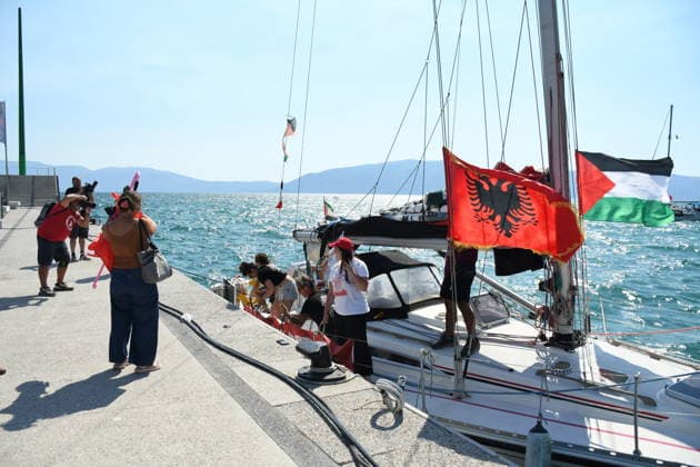 Global Sumud Flotilla activists arrive in Albania VLORE, ALBANIA - AUGUST 21: Boats carrying pro-Palestinian Italian and Albanian activists arrive off the coast of Vlore after sailing from Brindisi, Italy, on August 21, 2026 in Vlore, Albania. Several of the vessels had reportedly been damaged by the Israeli military during the flotilla s previous mission. The activists arrival coincides with the anniversary of the 1991 exodus in which thousands of Albanian refugees reached Italy s Puglia region aboard an overcrowded ship. The group is also expected to support the Flamingo Revolution protest against the reported sale of a beach in Zvernec for a tourism project allegedly linked to Ivanka Trump and Jared Kushner. Olsi Shehu Anadolu Vlore  Copyright: x2026xAnadoluxOlsixShehux